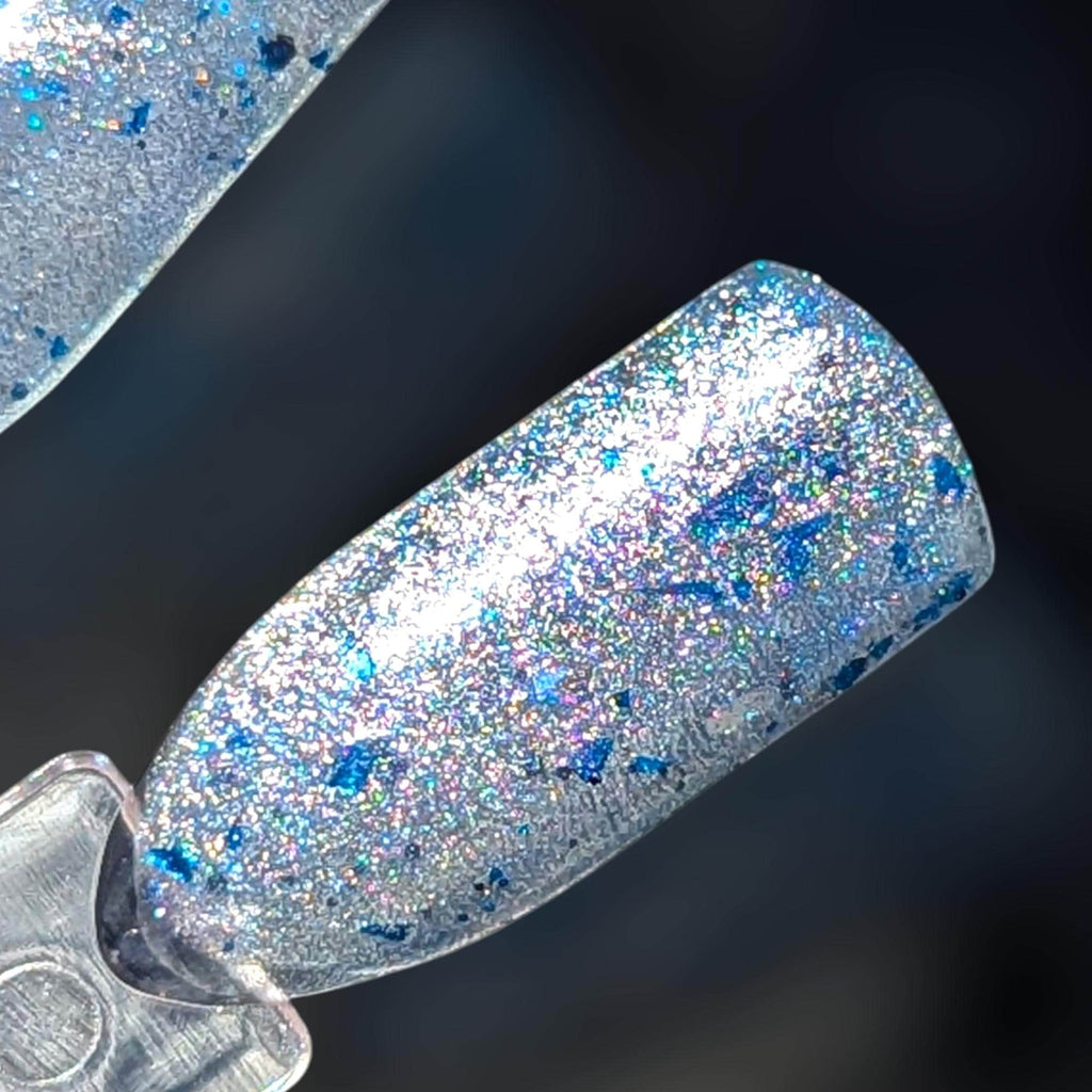 The Estes Method ~ Silver to Blue Glittery Holo Magnetic Sheer to Opaque Nail Polish