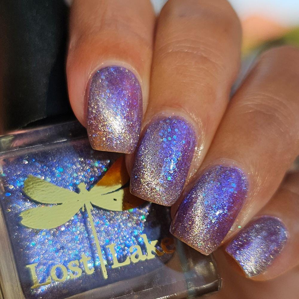 NORAD Santa Tracker | Magnetic pale periwinkle jelly with scattered green and purple holo flecks
