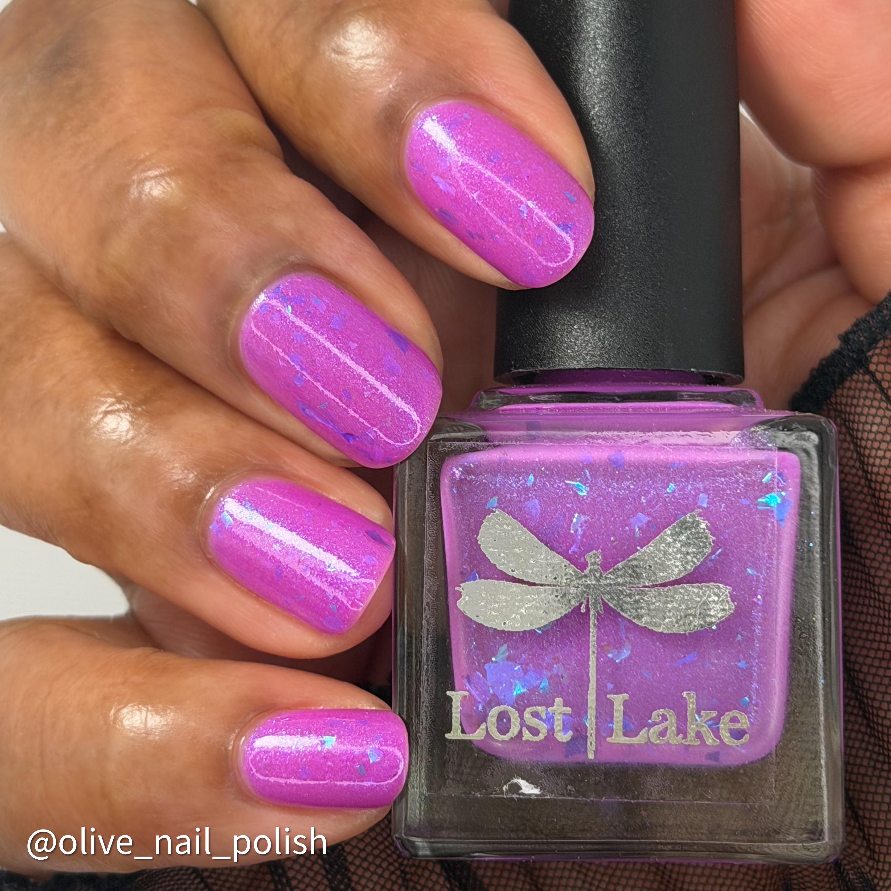 Ripley's Collection | 'Sploded from the Inside | Neon orchid pink polish with a scattering of blue chameleon flakies