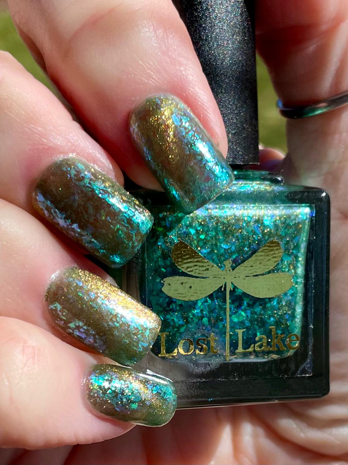A Light in the Forest | Green & Gold magnetic nail polish with shifting auroral flakies