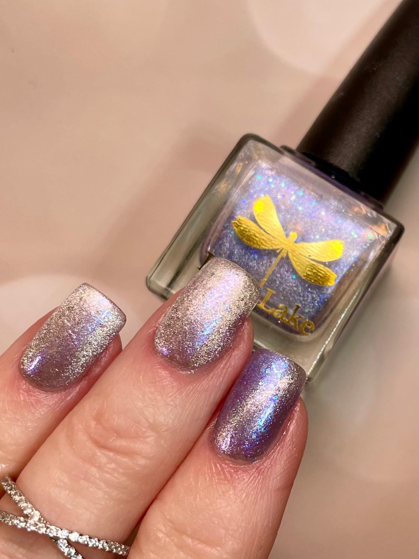 NORAD Santa Tracker | Magnetic pale periwinkle jelly with scattered green and purple holo flecks