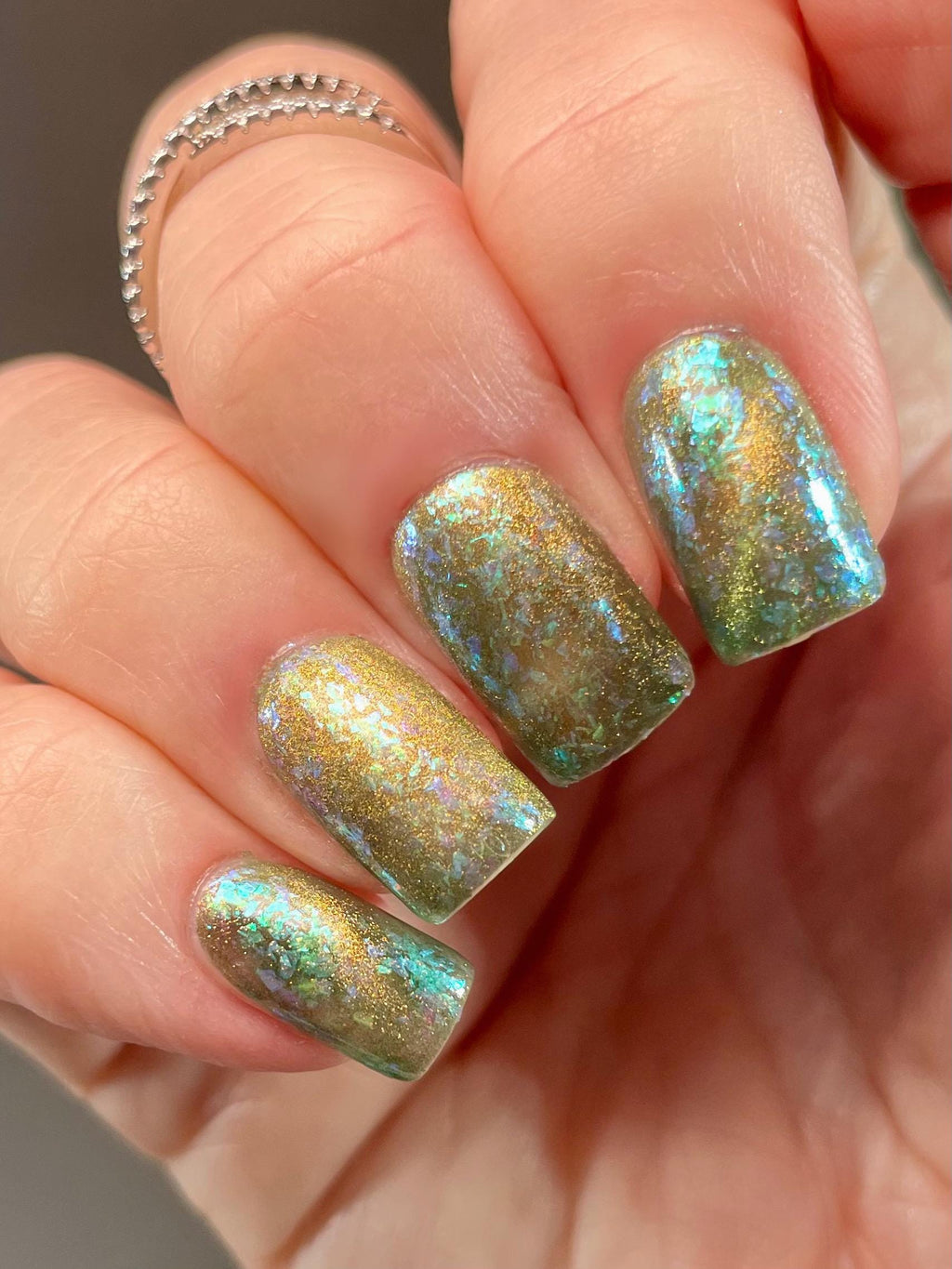 A Light in the Forest | Green & Gold magnetic nail polish with shifting auroral flakies