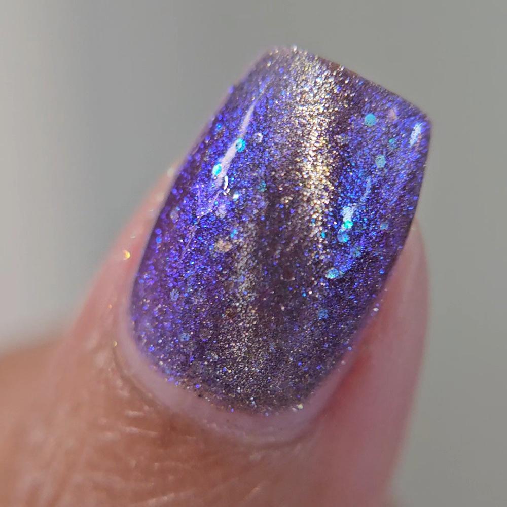 NORAD Santa Tracker | Magnetic pale periwinkle jelly with scattered green and purple holo flecks