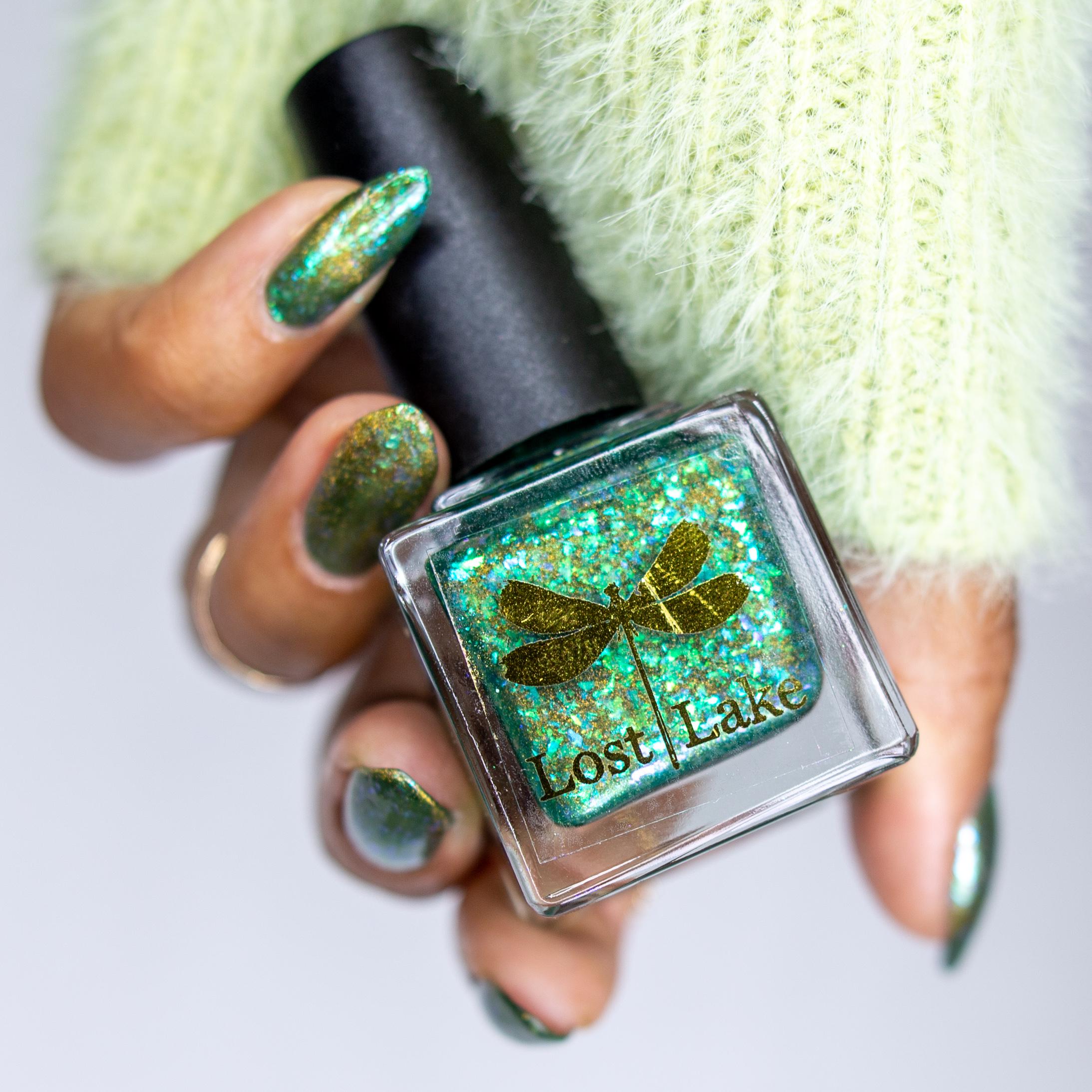 A Light in the Forest | Green & Gold magnetic nail polish with shifting auroral flakies
