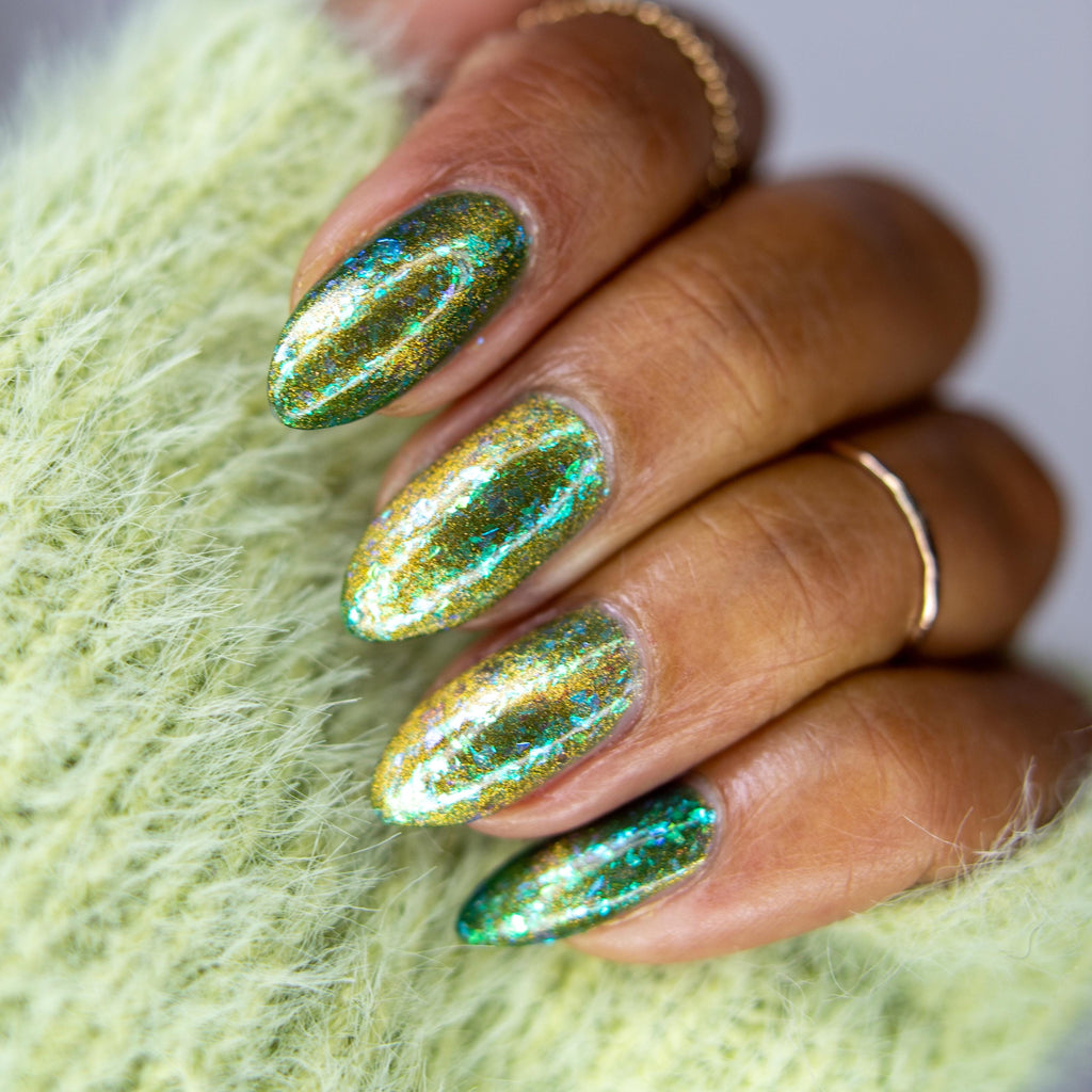 A Light in the Forest | Green & Gold magnetic nail polish with shifting auroral flakies