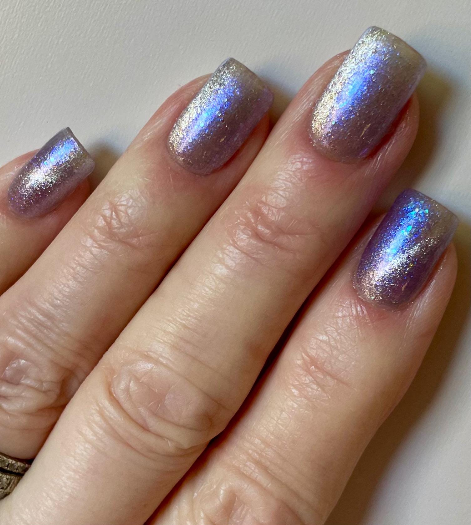 NORAD Santa Tracker | Magnetic pale periwinkle jelly with scattered green and purple holo flecks