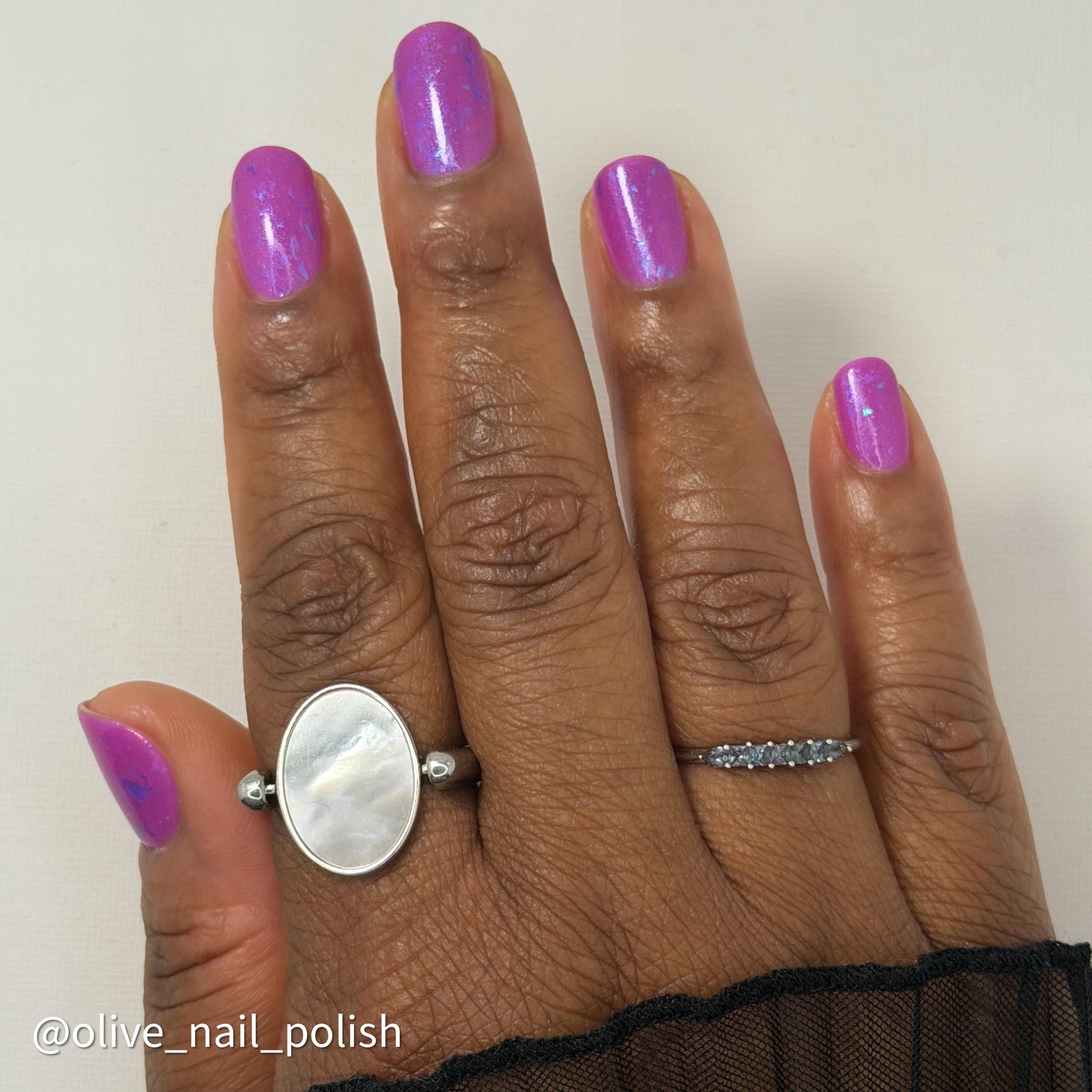 Ripley's Collection | 'Sploded from the Inside | Neon orchid pink polish with a scattering of blue chameleon flakies