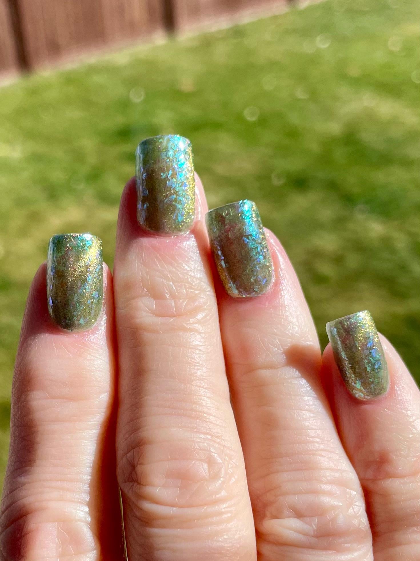 A Light in the Forest | Green & Gold magnetic nail polish with shifting auroral flakies