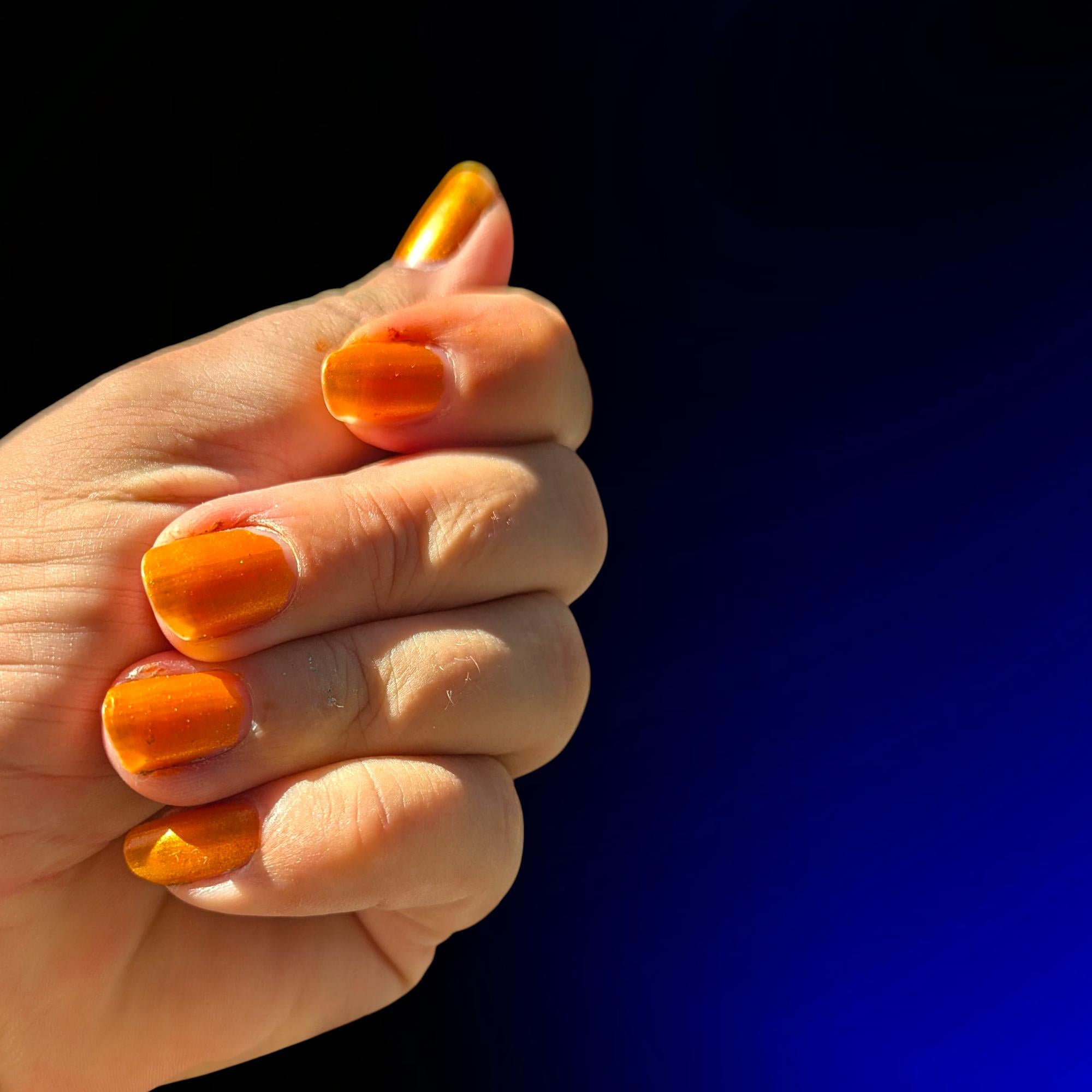 Best O(range) ~ Glowy opaque tangerine shimmer polish